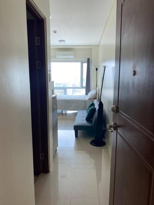 Makati Penthouse With Stunning City Skyline View مانيلا المظهر الخارجي الصورة